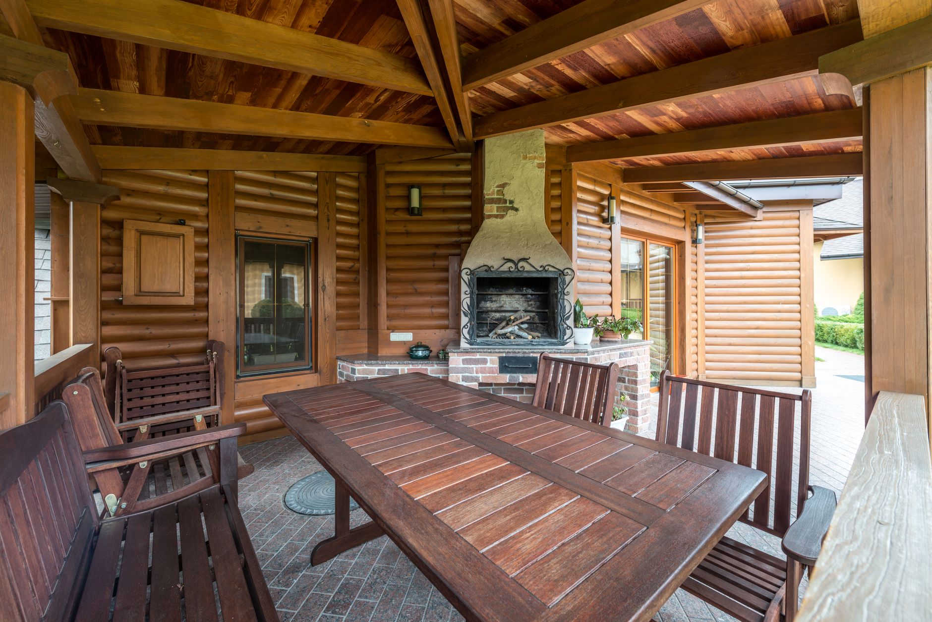 Backyard patio outdoor kitchen prepared for winter